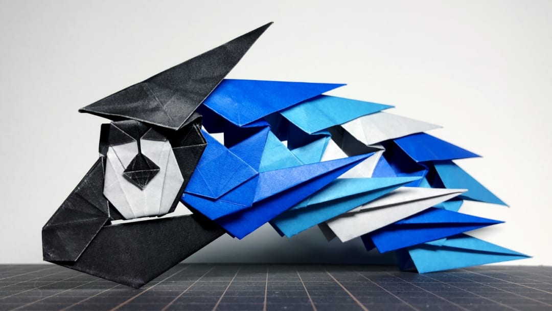How to fold 無限連結式こいのぼり: はじめは頭部も白地に目が黒色でしたがあまり似合わなかったので最初と同じように黒地に白のパターンにしています
