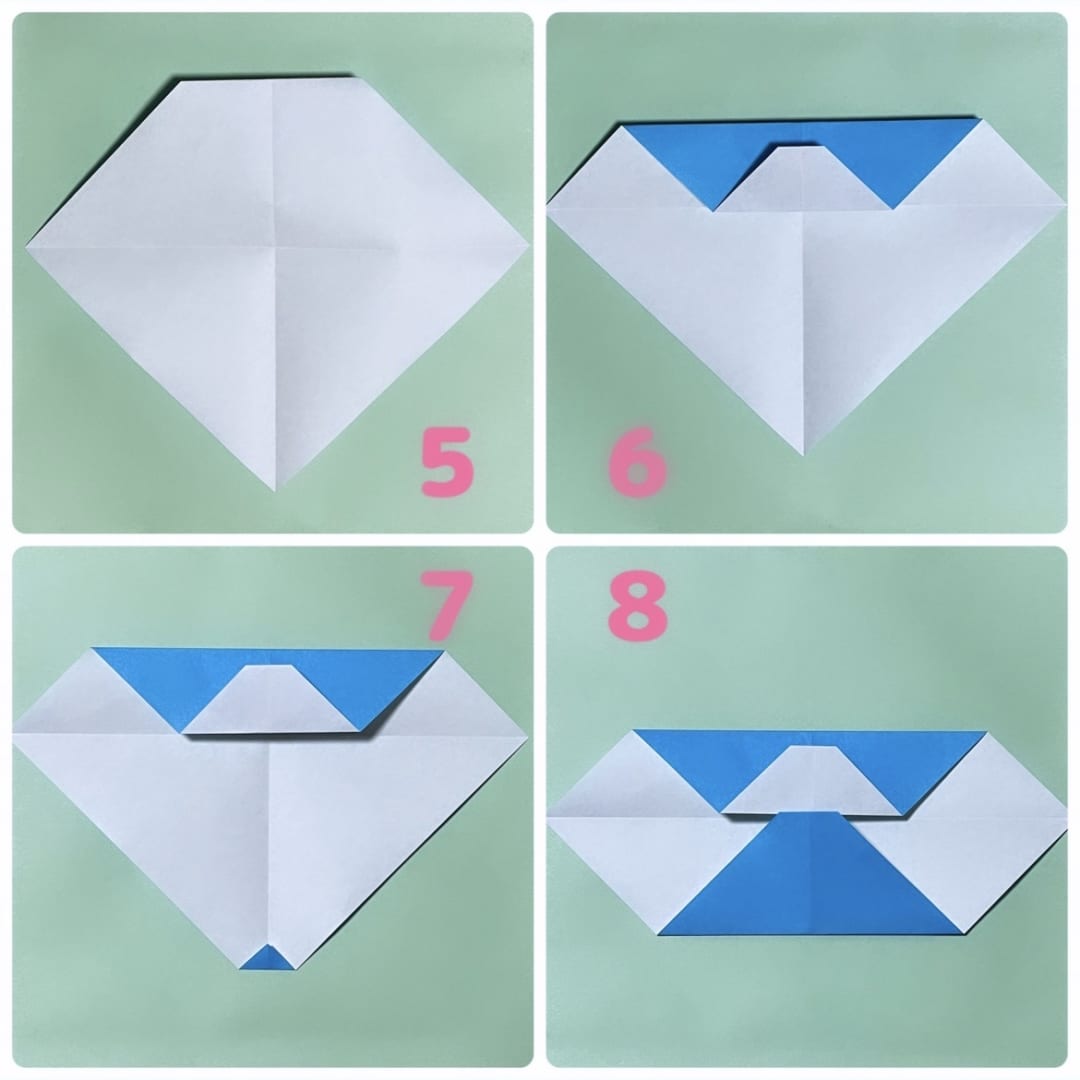 How to fold あかちゃん: ５　裏返します。
６　上の辺を、真ん中の線まで折ります。
７　下の角を少しだけ折ります。
８　今折ったところが、上の白い台形の下の辺に、1ミリくらい被るように折り上げます。