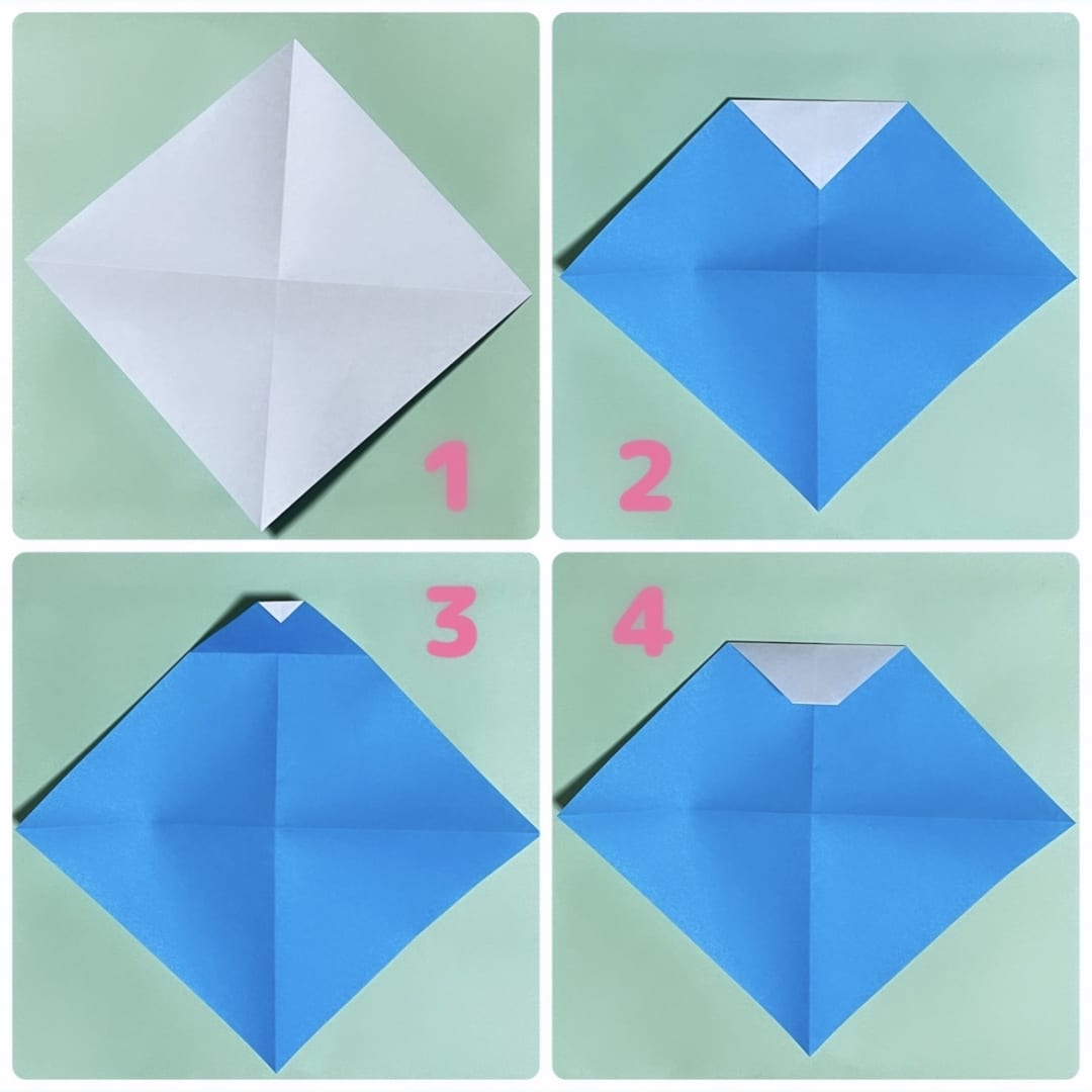 How to fold あかちゃん: １　対角線で折って、十字の印をつけます。
２　角の一箇所を、中央から三分の一あたりのところまで折ります。
３　今折ったところを一度戻し、角を少しだけ折ります。
４　2で折ったところを折り戻します。