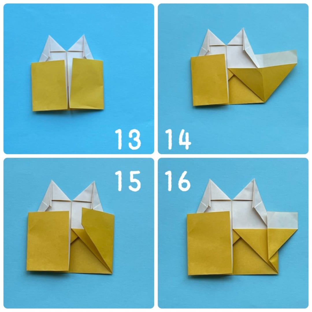 How to fold マグカップネコ＆うさぎ: 13  さんかくのちょうてんから、斜めに折ります。この時、下の四角い部分は折らないようにします。
13  下の四角の、片方だけ、開いて三角に折り潰します。
14  今折ったところを、内側に戻します。15  今折ったところを、外側から1センチ
くらいのところから、外側に折ります。