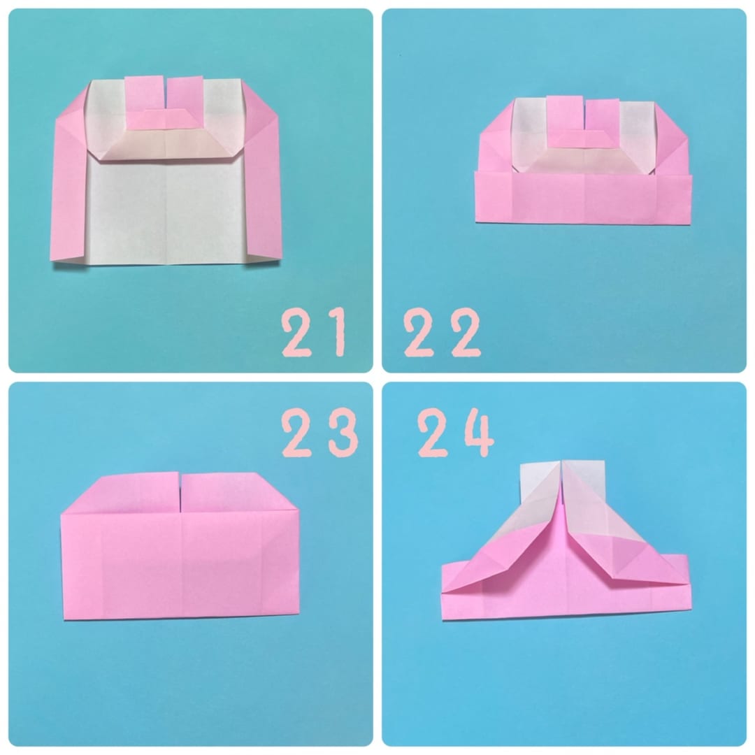How to fold ウサミミくん: 21 裏返します。
22 下の辺を、折り返してあるところまで図のように折ります。
23 裏返します。
24 真ん中の線と、上の辺が合うように、両側を折ります。