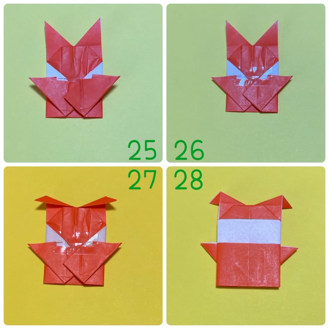 ネコミミくんの折り方 25 右側も同じように折ります。
26 このままだと、浮いてしまうので、テープや糊で留めてください。
27 上の三角の斜めの辺を、下の水平の辺に合うように折ります。
28 裏返します。